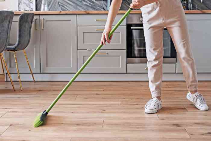 Sweeping porch sweep energetic welcoming cobwebs